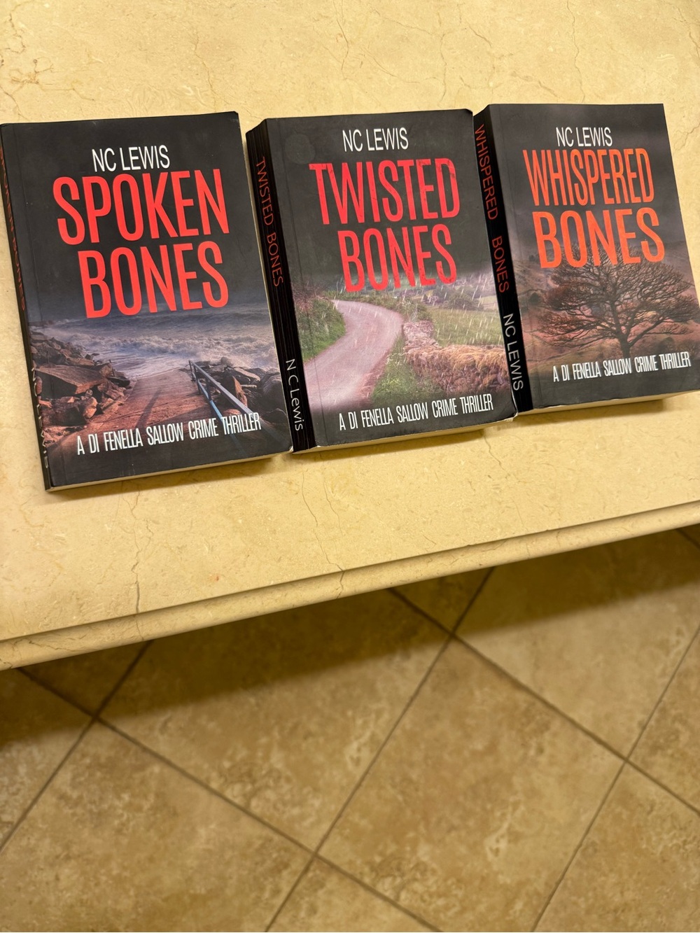 Set of 3 NC Lewis books -spoken Bones , Whispered bones , and Twisted Bones